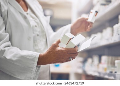 Pharmacist, hands and box for drugs with document at shelf for medicine, check and inventory for health. Person, employee and container for prescription, search and pharma paperwork for pills at shop - Powered by Shutterstock