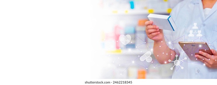 A pharmacist holds computer tablet to receive a doctor's prescription, prepare medicine and check medicine in a pharmacy.copy space - Powered by Shutterstock