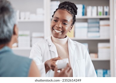 Pharmacist, medicine or black woman with pills supplements for patient for wellness or help. Pharmacy, smile or doctor giving a mature woman medical product or medication box in retail healthcare - Powered by Shutterstock