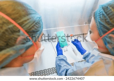 pharmacist preparing high risk chemotherapy medicine for oncology, cancer patient. pharmacists prepare medicines for treatment in the laboratory