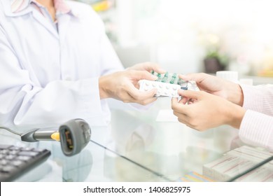 Pharmacist Use Hand Send Drug Strip Pack To Patient Costumer In Drugstore, Safety And Medication Process