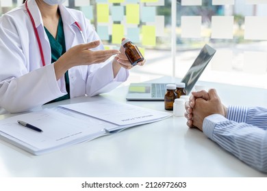 Pharmacists are recommending medicines to patients after being examined and diagnosed by the patient's doctor, the concept of treatment and symptomatic medication dispensing by the pharmacist. - Shutterstock ID 2126972603