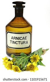 pharmacy bottle with arnica tincture isolated on white background