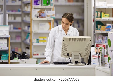 Pharmacy, computer and stock list with woman at counter in drugstore for customer service, advice and medicine. Prescription drugs, pharmacist and inventory for pills, medication and chemist checkout - Powered by Shutterstock