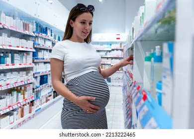 Pharmacy Counter Pregnant Woman. Happy Pregnancy Girl Customer In Retail Health Drugstore. Pregnancy, Medicine Health Care Concept