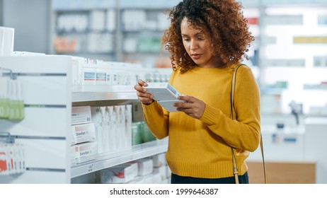 Pharmacy Drugstore: Beautiful Black Young Woman Walking Between Aisles And Shelves Shopping For Medicine, Drugs, Vitamins, Supplements, Health Care Beauty Products With Modern Package Design