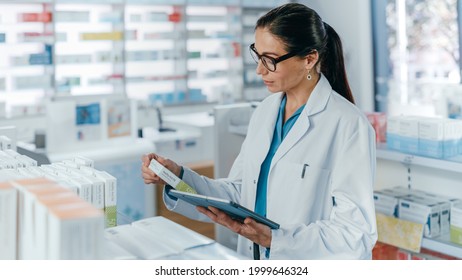 Pharmacy Drugstore: Beautiful Caucasian Pharmacist Uses Digital Tablet Computer, Checks Inventory Of Medicine, Drugs, Vitamins, Health Care Products On A Shelf. Professional Pharmacist In Pharma Store