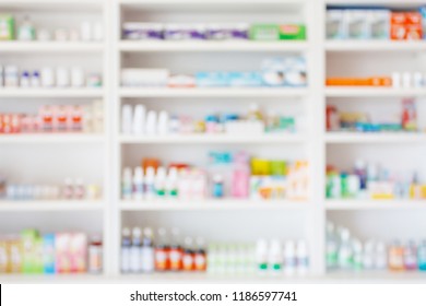 Pharmacy drugstore blur abstract background with medicine and healthcare product on shelves