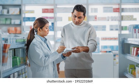 Pharmacy Drugstore: Female Asian Pharmacist Helping Indian Male Customer with Recommendation, and Advice to Buy Medicine, Drugs, Vitamins. Modern Pharma Store Shelves with Health Care Products - Powered by Shutterstock