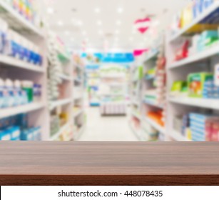 Pharmacy And Drugstore, Wood Table Counter Top On Blurred Shelves Pharmacy Store