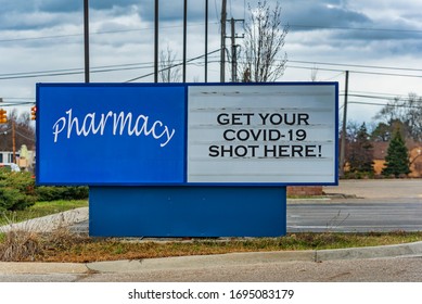 Pharmacy Sign With COVID-19 Shots