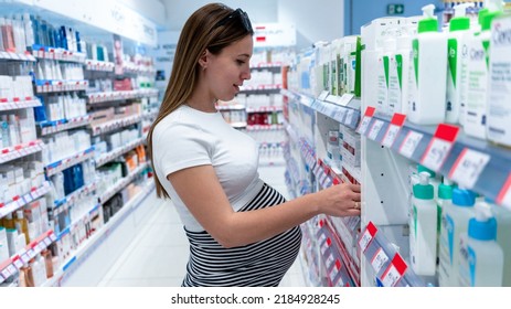 Pharmacy Store Pregnant Woman. Happy Pregnancy Women Customer In Retail Health Drugstore. Concept Of Pregnancy, Maternity, Expectation For Baby Birth