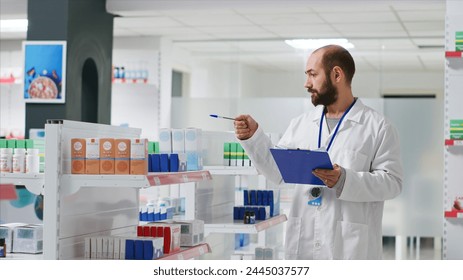 Pharmacy worker writing every medical product on inventory, creating long list with all pharmaceutics and medicaments in drugstore. Pharmacist ensuring variety of healthcare supplies. Camera 2. - Powered by Shutterstock