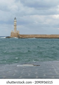 Pharos lighthouse protects the Old Venetian harbor in Chania on Crete, Greece
