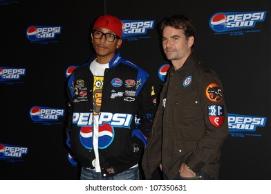 Pharrell Williams And Jeff Gordon  At Pepsi 500 Running Wide Open. Avalon, Hollywood, CA. 08-27-08