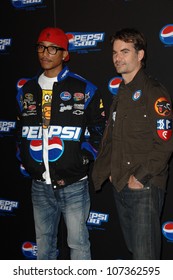 Pharrell Williams And Jeff Gordon  At Pepsi 500 Running Wide Open. Avalon, Hollywood, CA. 08-27-08