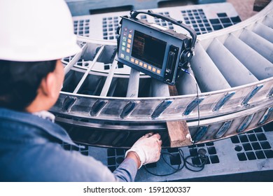 Phased array (PAUT), ultrasound tests to check for imperfections or faults in external steel pipe welding, NDT inspection. - Shutterstock ID 1591200337