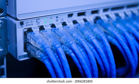 Phatthalung , THAILAND - JULY 10 2021 : Close Up Cisco 9200L- 48 , Gigabit Switch For Business And Datacenter With UTP Cat6 Network Cable