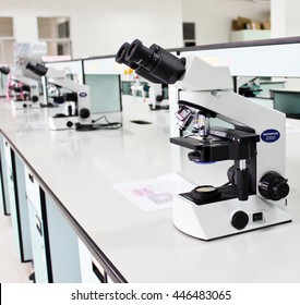 PHAYAO, TH - June 13, 2014: Olympus CX21 Biological Microscope Is Used In Diverse Fields Ranging From Electronic, Chemical, Metallurgical, Textile, Medicine, Biology, And More.