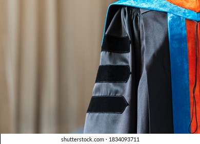 PhD Graduate In Black Gown University Degree