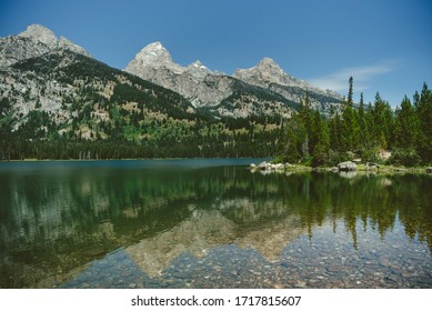 phelps lake jackson hole wyoming mountain reflection