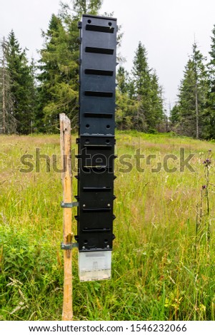 Pheromone trap set on a clearing by the forest.
