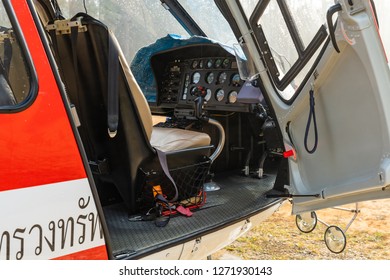 PHETCHABOON, THAILAND - DEC.25, 2018 : Airbus Eurocopter AS350 helicopter door open showing pilot seat, control panel and control stick