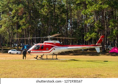 PHETCHABOON, THAILAND - DEC.25, 2018 : Airbus Eurocopter AS350 helicopter of Ministry of Natural Resources and Environment of Thailand at Tung Salang Luang National Park ready to take off from helipad
