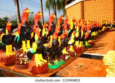 PHETCHABUN, THAILAND - NOVEMBER 28, 2010: Doll Elephant And The Row Of Chicken Doll Near The Monument And Spirit House Of Thiland