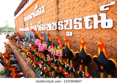 PHETCHABUN, THAILAND - NOVEMBER 28, 2010: Doll Elephant And The Row Of Chicken Doll Near The Monument And Spirit House Of Thiland