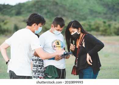 Phetchaburi, Thailand -July 9,2021:Behind The Scene. Film Crew Team Filming Movie Scene On Outdoor Location While Wearing Mask Prevent Covid-19 Or Coronavirus Quarantine Pandemic In Thailand.