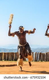 Phezulu village, Botha’s Hill, South Africa - August 19, 2013: Zulu dressed in traditional gear dancing. 