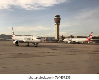 PHILADELPHIA, ARIZONA, USA - OCT 19, 2017: Philadelphia International Airport, American Airlines Aircraft on runway moving towards take off area and passing by tower control.