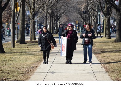 PHILADELPHIA, PA - JANUARY 20, 2018: protesters holding protest signs at Women's March on Philadelphia - Shutterstock ID 1006085668