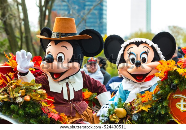 Philadelphia, PA - November 24, 2016: Mickey and Minnie Mouse ride in a carriage in the annual Thanksgiving Day parade.