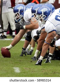 PHILADELPHIA, PA. - SEPTEMBER 26 :  Buffalo Offensive Linemen Get Ready To Hike The Football Against The Temple Owls September 26, 2009 In Philadelphia, PA.