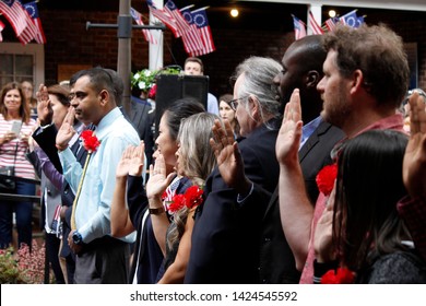 Philadelphia, PA / USA - June 14, 2019: Thirteen Immigrants Officially Become New U.S. Citizens In A Special Naturalization Ceremony On Flag Day At The Historic Betsy Ross House In Philadelphia,