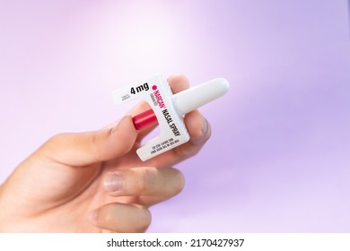 Philadelphia, PA, USA - June 2022 - Hand Holding A Narcan Evzio Naloxone Nasal Spray Opioid Drug Overdose Prevention Medication