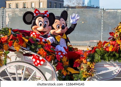 Philadelphia, PA, USA - November 26, 2015: Mickey and Minnie Mouse ride in an open carriage in the annual Thanksgiving Day parade.