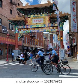 Philadelphia, PA/USA; August 21th 2019: Chinatown Friendship Arch At Philly, Biker Police, Stores And Restaurants.