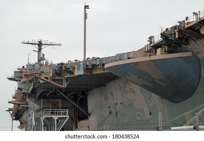 PHILADELPHIA, PENNSYLVANIA - February 16, 2014:   Decommissioned Aircraft Carrier USS John F. Kennedy At The NAVSEA Inactive Ships On-site Maintenance Facility At The Philadelphia Navy Yard.