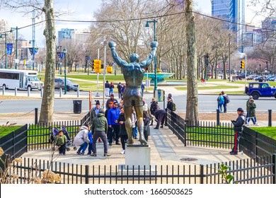 Philadelphia, Pennsylvania - February 29, 2020: “Rocky” (1980) statue by A. Thomas Schomberg located at the entrance to the Philadelphia Museum of Art; Kelly Drive and Benjamin Franklin Parkway.