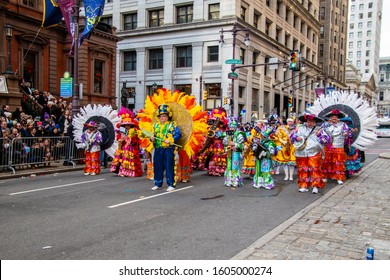 Philadelphia, Pennsylvania - January 1, 2020: New Years Day Mummers Parade Men In Colorful Costumes Strut And Perform On Broad Street In This Annual Tradition