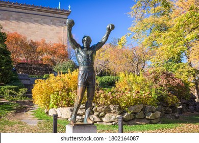 PHILADELPHIA, PENNSYLVANIA - NOVEMBR 16, 2016: The Rocky Balboa statue during autumn. The statue commemorates the The Rocky film series which has become a cultural icon. 