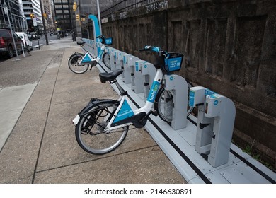 Philadelphia, Pennsylvania, USA - April 6, 2022: An Indego Bike Share Dock On The Sidewalk On 20th Street In Center City Philadelphia