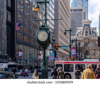 Philadelphia, Pennsylvania, USA February 28, 2020. Town Street During Rush Hour Spring Time With People Walking, Trucks And Cars.