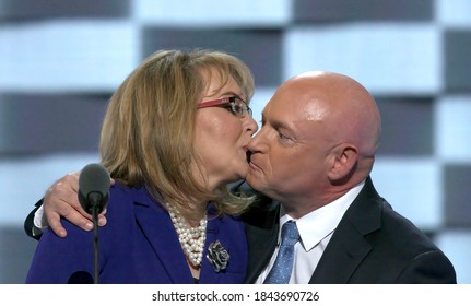 Philadelphia, Pennsylvania, USA July 27, 2016
Former Congresswoman Gabby Giffords (L) Kisses Her Husband And Former Astronaut Mark Kelly After Addressing The Democratic National Convention