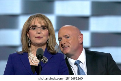 Philadelphia, Pennsylvania, USA July 27, 2016
Former Congresswoman Gabby Giffords (L) Speaks As Her Husband And Former Astronaut Mark Kelly Looks On At The Democratic National Convention