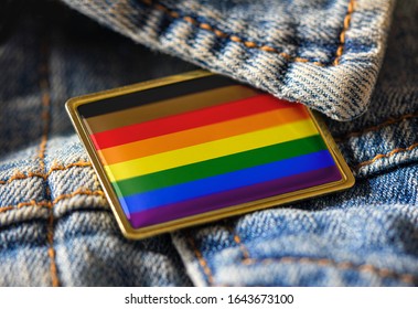 Philadelphia People Of Color Inclusive Flag Pin On A Denim Jacket For LGBTQ Identity, Pride, And Activism. The Intersectional Flag Design Is Public Domain For All Uses.