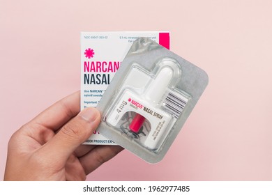 Philadelphia, USA, 2021 - Hand holding a Narcan Evzio Naloxone nasal spray opioid drug overdose prevention medication